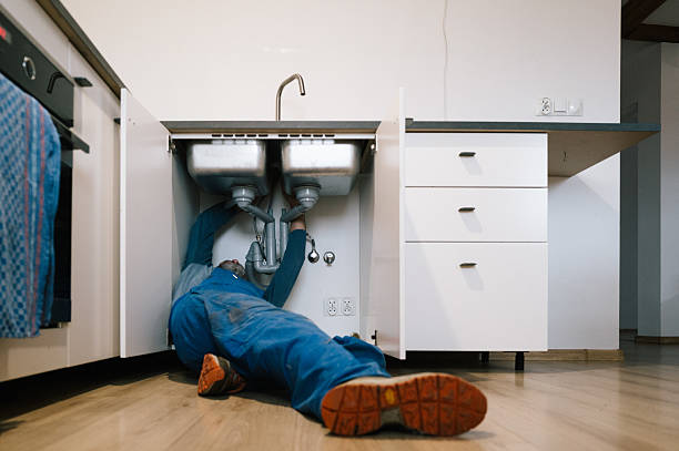 Professional Plumbing technician working in Lake Isabella, MI